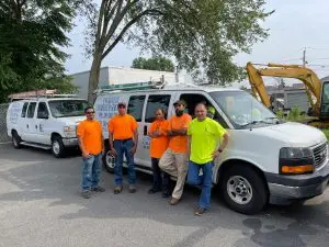 EPS team of certified technicians and staff smiling at gas station site